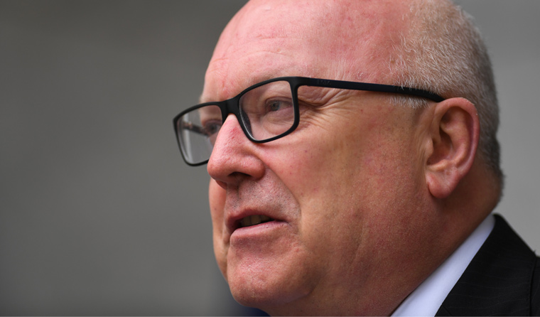 High Commissioner to the UK George Brandis has told a British radio program that all asylum seeker children will be removed from Nauru by the end of the year. (Image: Lukas Coch)