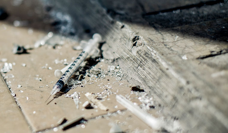 Discarded syringe