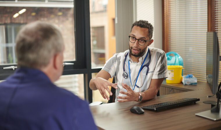 GP speaking to a patient.