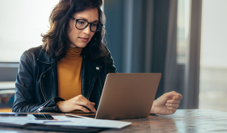 Woman using a computer.