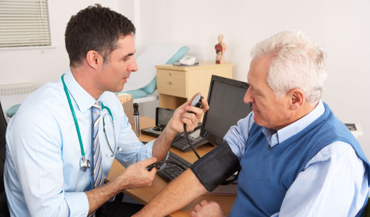 GP with elderly patient
