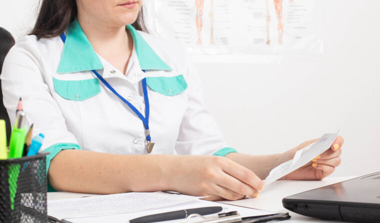 Allied health professional with letter
