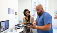 GP and practice nurse talking