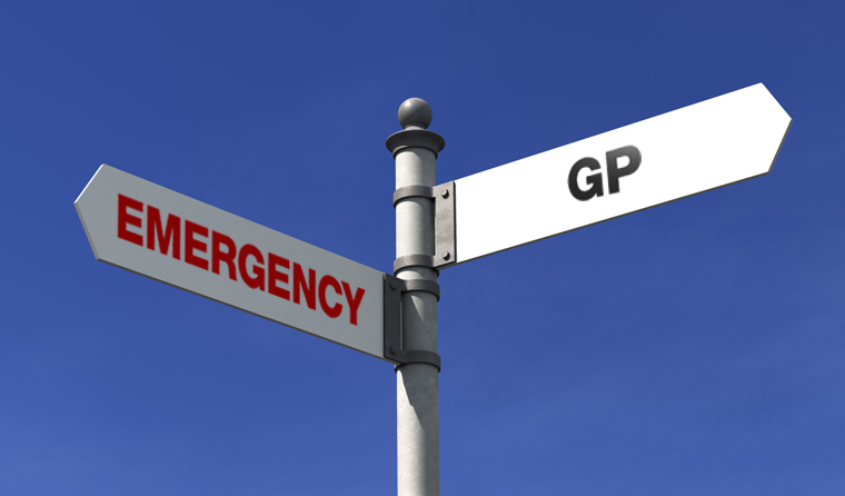 Sign pointing to GP or emergency