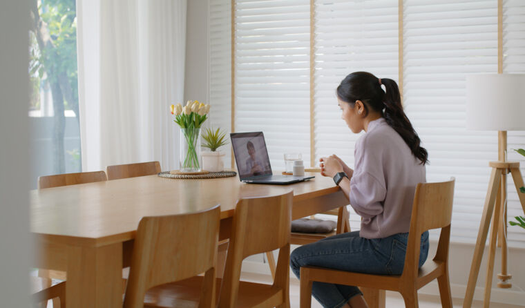 Woman using a computer.