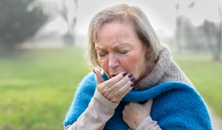Woman coughing