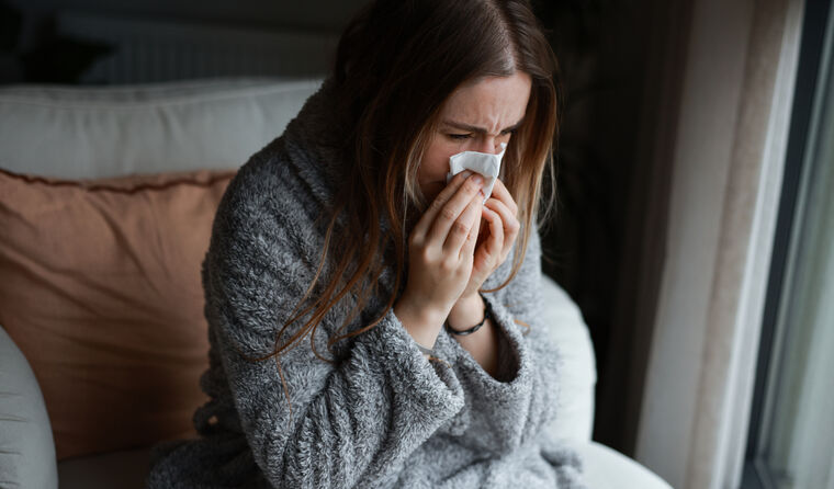Woman sick with the flu