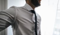 Man sweating through his shirt.