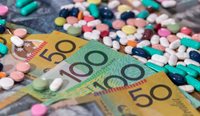  Colourful pills with Australian dollars on table