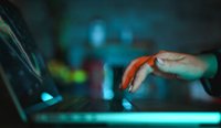 hacker on laptop