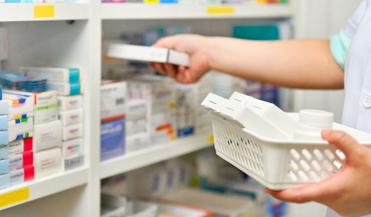 Collecting medicine from pharmacy shelves