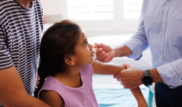 Little girl being vaccinated