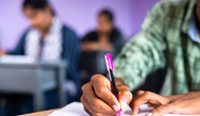 Close up of person sitting for written exam