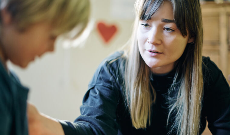 Doctor helping a child. 
