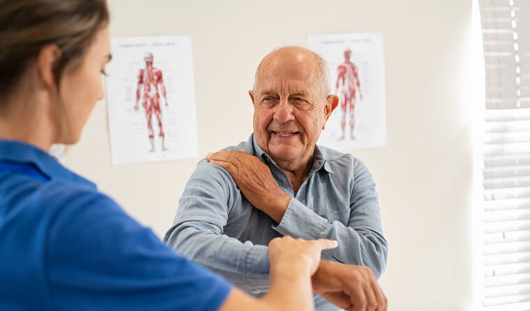 Older male patient with doctor
