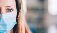 Healthcare worker wearing face mask.