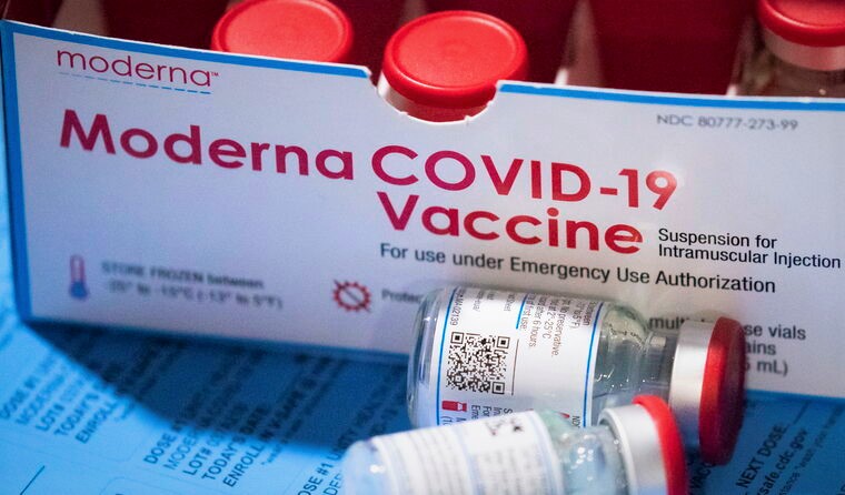 A box of Moderna COVID-19 vaccine vials. 