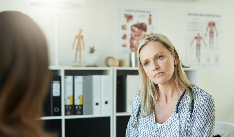 GP speaking to a patient.