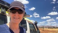 Dr Donna O’Kane pauses for a photograph on the way to a weekly clinic at Ikunttji outstation in Papunya, where she lives and works. 