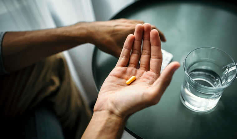 Man taking pill