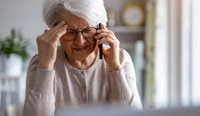 Sick older woman on phone