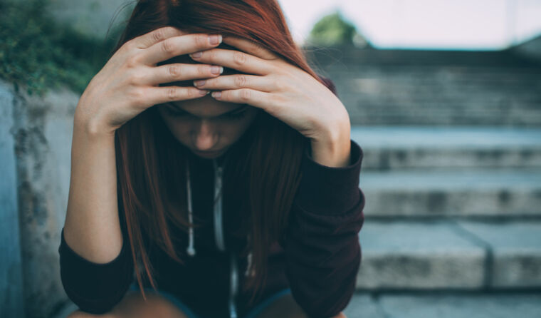 Young woman suffering mental distress