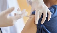 Person being injected with influenza vaccination