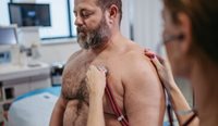 GP assessing man with obesity
