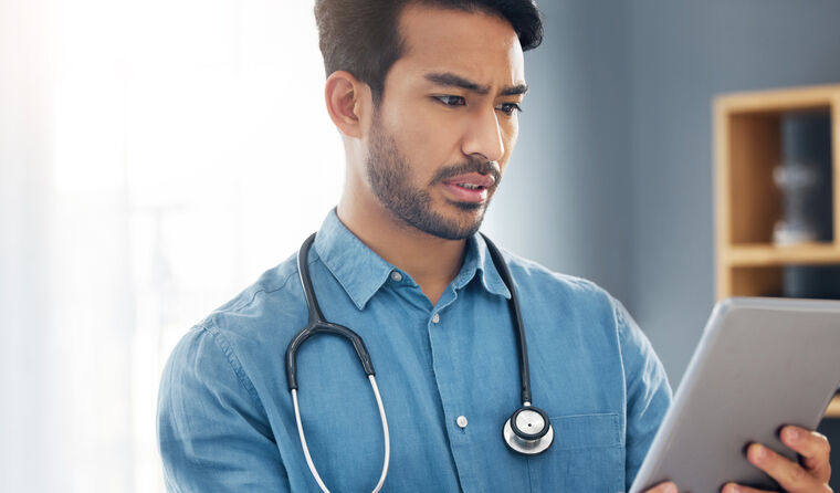 GP looking confused at iPad