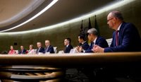 Prime Minister Anthony Albanese sitting alongside state and territory leaders following a national cabinet meeting on Friday. (Image: AAP/Bianca De Marchi)