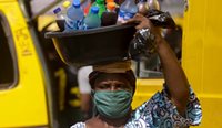 Woman selling water in Nigeria