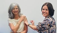 SA’s Chief Public Health Officer Professor Nicola Spurrier receives her flu vaccination from RACGP Board and SA Chair Dr Siân Goodson. 