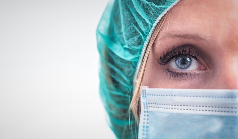 Close up shot of young, female healthcare worker.