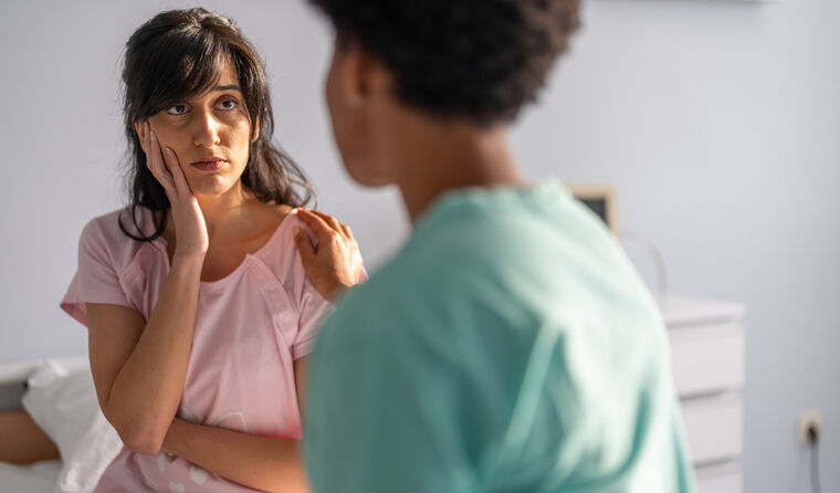 A female GP and female patient.