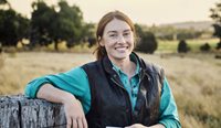 Young female rural doctor standing outdoors