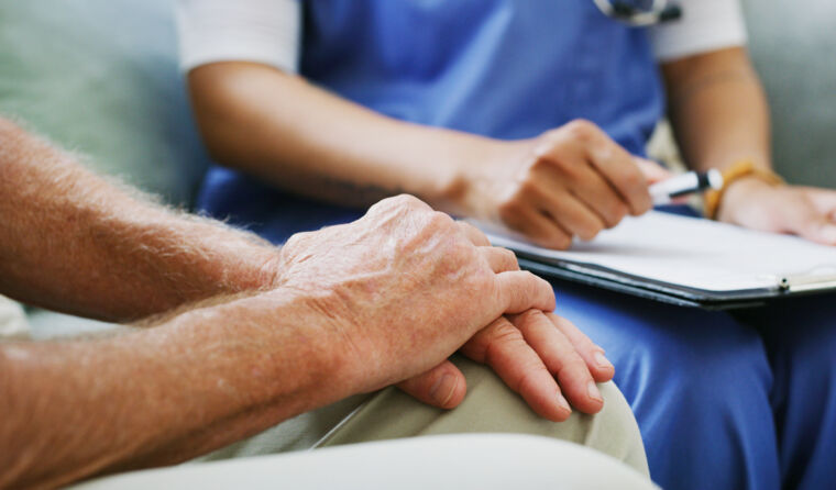 Person with PTSD with health professional