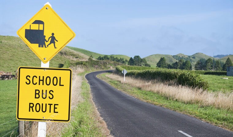School sign on rural road