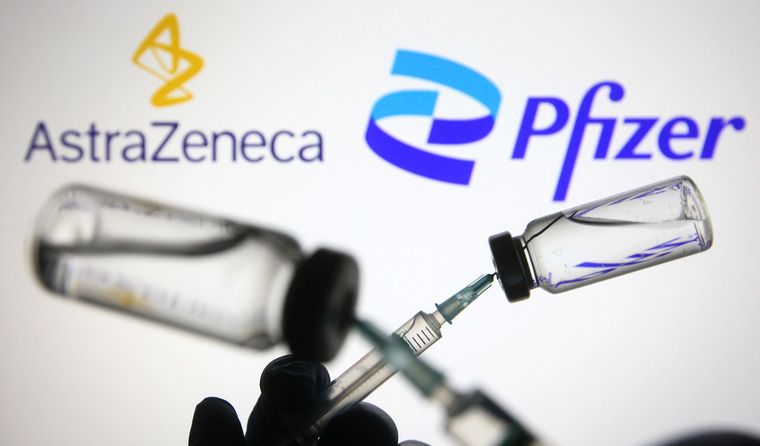 AstraZeneca and Pfizer vials.