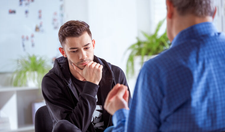 GP in mental health care consult with patient