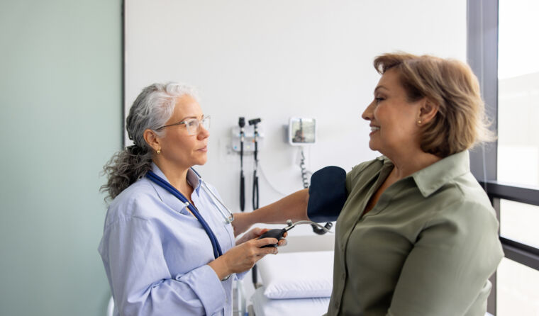 Woman in consult with GP