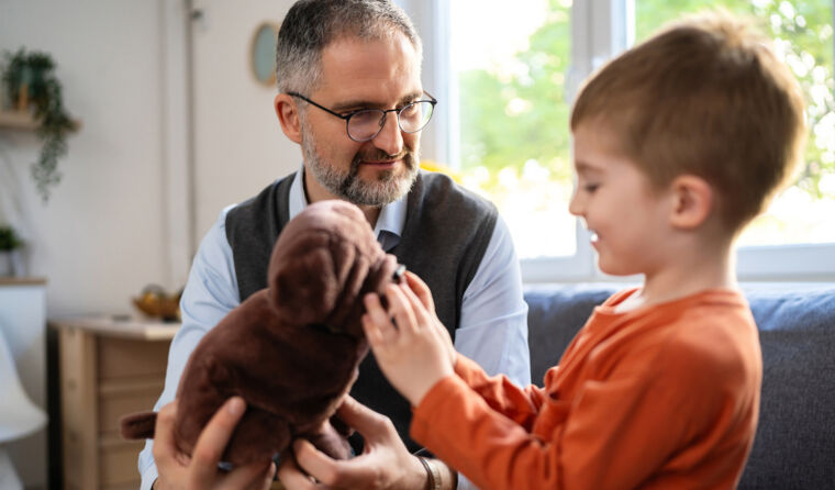Doctor consulting with a child.