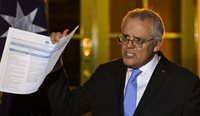 Prime Minister Scott Morrison revealing the four-phase plan to reporters following National Cabinet. (Image: AAP)