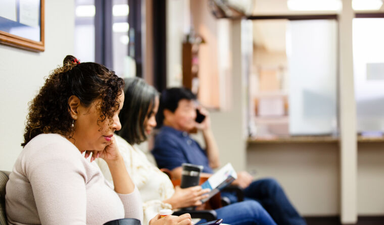 Group of patients in GP waiting room