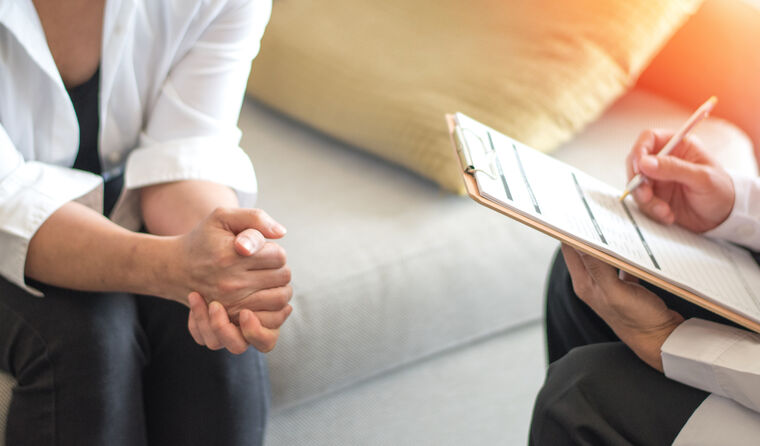 Psychiatrist assessing patient