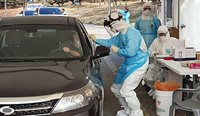 South Korea has pioneered drive-thru clinics to test for coronavirus. (Image: AAP)