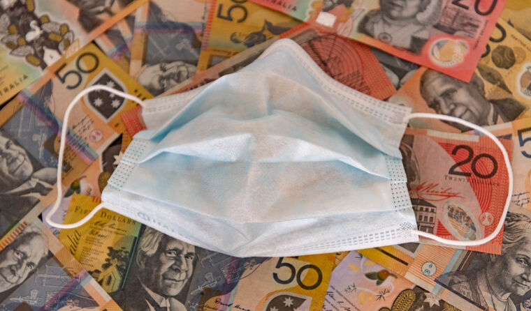 Surgical mask sitting on money