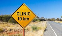 Road sign indicating nearest clinic is 10km away.