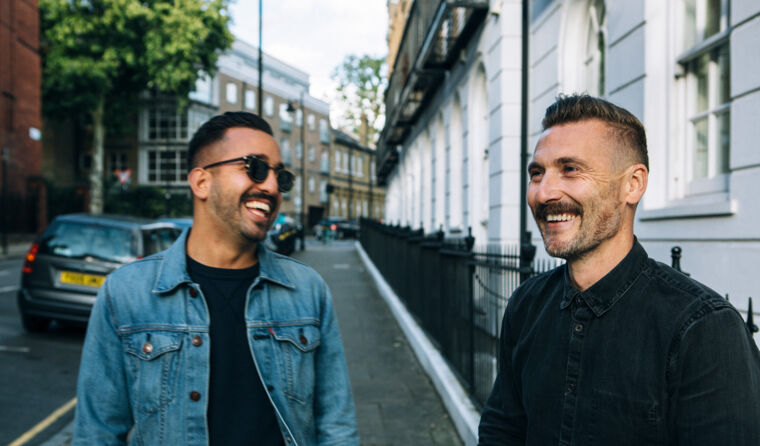 Two men talking.