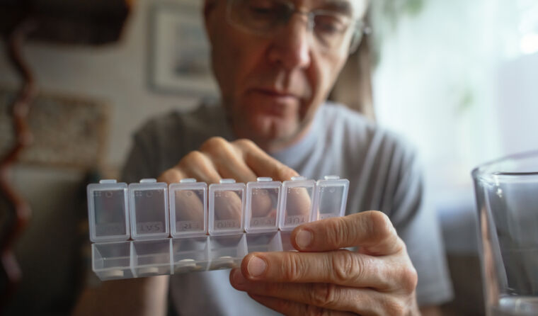 older man with multiple medications
