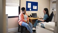Female patient talking with female GP